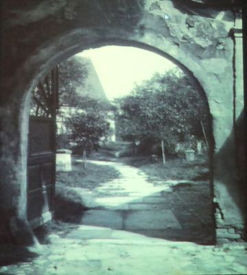 branka do hřbitova na místě současných Smetanových sadů